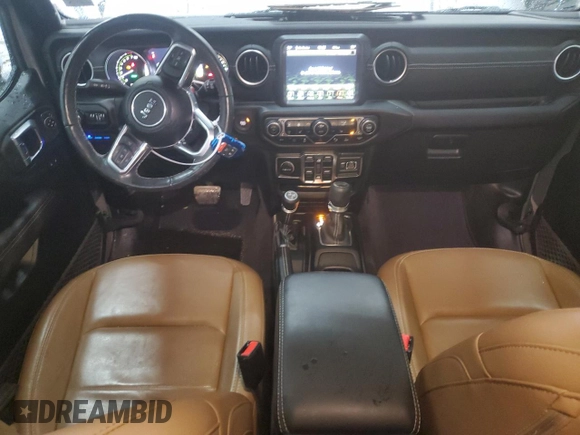 2021 Jeep Wrangler Unlimited Sahara with VIN 1C4JJXP65MW682462, listed as a Copart auction lot 58673385 with 38,714 mi miles and Salvage title. Bid and sale history available at DreamBid. Image 8.