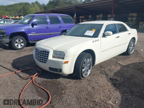 2005 Chrysler 300 with VIN 2C3JA53G65H130590, listed as a IAAI auction lot 41822725 with 1 mi miles. Bid and sale history available at carsss.com. Image 2.