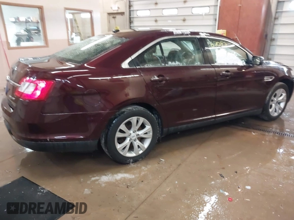 2011 Ford Taurus SEL z VIN 1FAHP2HW5BG141570, wystawiony jako IAAI lot #41867097 z przebiegiem 172 984 mil mil oraz . Historia ofert i sprzedaży dostępna na DreamBid. Obrazek 4.