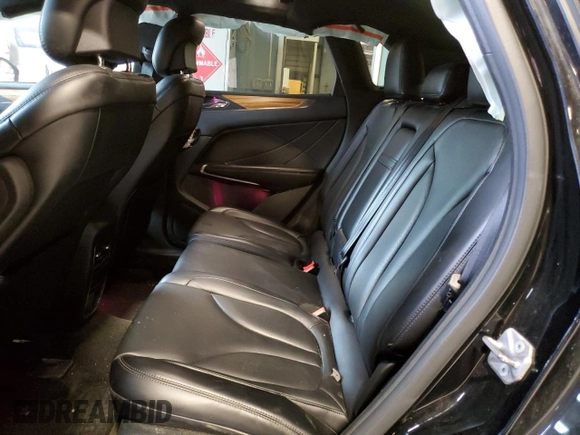 2016 Lincoln MKC Select z VIN 5LMCJ2D9XGUJ31639, wystawiony jako Copart lot #62773445 z przebiegiem 75 461 mil mil oraz Szkoda całkowita • Salvage title. Historia ofert i sprzedaży dostępna na DreamBid. Obrazek 11.