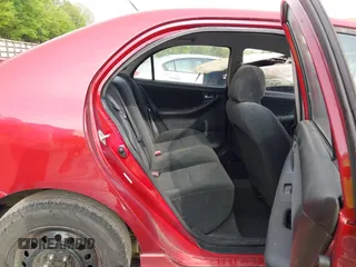 2003 Toyota Corolla CE with VIN 1NXBR32EX3Z153339, listed as a IAAI auction lot 42097274 with 214,674 mi miles and . Bid and sale history available at DreamBid. Image 8.