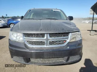 2016 Dodge Journey SE with VIN 3C4PDCABXGT103296, listed as a Copart auction lot 56358715 with 106,821 mi miles and Clean Title. Bid and sale history available at DreamBid. Image 5.