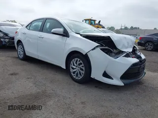 2018 Toyota Corolla L with VIN 5YFBURHE2JP854769, listed as a IAAI auction lot 42287437 with 107,102 mi miles and . Bid and sale history available at DreamBid. Image 1.