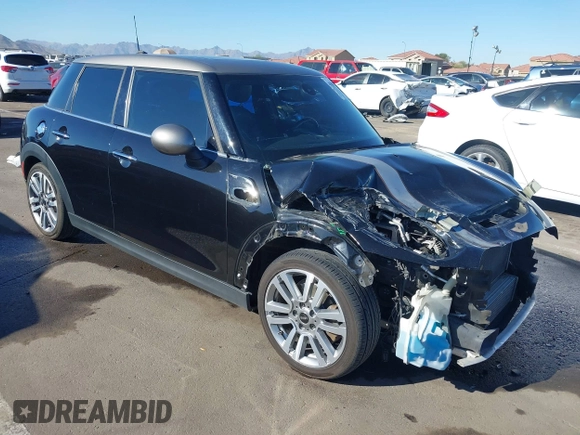 2017 MINI Hardtop 4 Door Cooper S z VIN WMWXU3C56H2D33072, wystawiony jako IAAI lot #41847726 z przebiegiem 81 783 mil mil oraz . Historia ofert i sprzedaży dostępna na DreamBid. Obrazek 1.