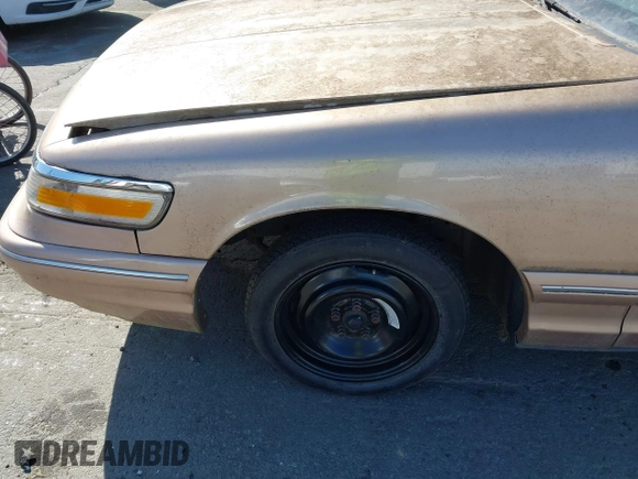 1996 Mercury Grand Marquis GS with VIN 2MELM74W3TX670994, listed as a IAAI auction lot 42052604 with 46,728 mi miles and . Bid and sale history available at DreamBid. Image 6.