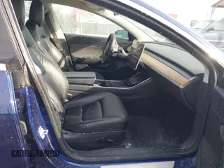 2018 Tesla Model 3 Long Range Battery with VIN 5YJ3E1EB8JF115138, listed as a IAAI auction lot 41343399 with 62,351 mi miles and . Bid and sale history available at DreamBid. Image 5.