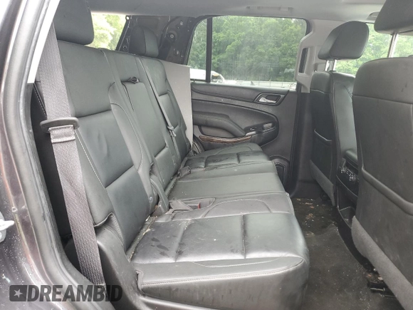 2018 Chevrolet Tahoe LT with VIN 1GNSKBKC8JR268689, listed as a Copart auction lot 58199955 with 131,906 mi miles and Salvage title. Bid and sale history available at DreamBid. Image 11.