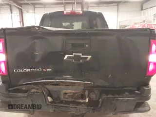 2020 Chevrolet Colorado 4WD Work Truck z VIN 1GCGTBEN2L1178464, wystawiony jako IAAI lot #42020876 z przebiegiem 111 698 mil mil oraz . Historia ofert i sprzedaży dostępna na DreamBid. Obrazek 6.