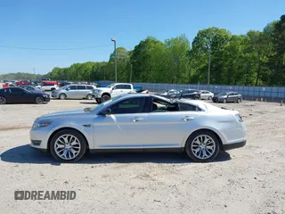 2016 Ford Taurus Limited with VIN 1FAHP2F86GG111666, listed as a IAAI auction lot 42062953 with 64,813 mi miles and . Bid and sale history available at carsss.com. Image 14.