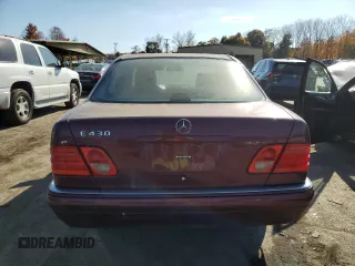 1998 Mercedes-Benz E with VIN WDBJF70F1WA503781, listed as a Copart auction lot 77284784 with Not Provided miles and Clean Title. Bid and sale history available at DreamBid. Image 6.