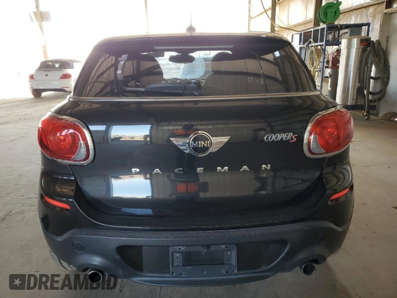 2015 MINI Paceman S with VIN WMWSS5C54FWS99857, listed as a Copart auction lot 54612555 with 65,843 mi miles and Salvage Title. Bid and sale history available at DreamBid. Image 6.