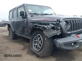 2024 Jeep Wrangler Rubicon with VIN 1C4PJXFG1RW314131, listed as a IAAI auction lot 41472426 with Not provided miles and . Bid and sale history available at DreamBid. Image 6.