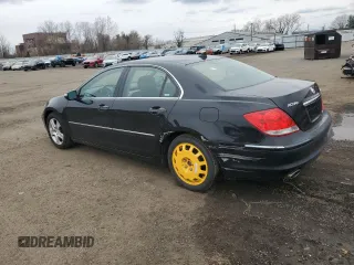 2006 Acura RL with VIN JH4KB16576C003138, listed as a Copart auction lot 52933995 with 176,906 mi miles and Salvage Title. Bid and sale history available at DreamBid. Image 2.