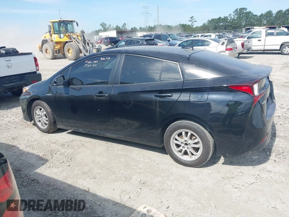 2021 Toyota Prius L Eco with VIN JTDKAMFU6M3141392, listed as a IAAI auction lot 42317866 with 137,495 mi miles and . Bid and sale history available at DreamBid. Image 13.