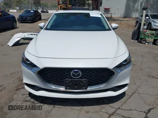 2023 Mazda 3 S Carbon Edition with VIN 3MZBPACM1PM356552, listed as a IAAI auction lot 42603574 with 20,092 mi miles and . Bid and sale history available at DreamBid. Image 13.