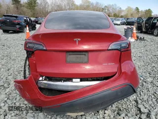 2022 Tesla Model Y Long Range z VIN 7SAYGDEE5NF387781, wystawiony jako Copart lot #50248215 z przebiegiem 24 173 mil mil oraz Szkoda całkowita • Salvage title. Historia ofert i sprzedaży dostępna na DreamBid. Obrazek 6.