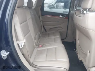 2012 Jeep Grand Cherokee Overland with VIN 1C4RJFCT9CC182216, listed as a IAAI auction lot 41490446 with 153,237 mi miles. Bid and sale history available at carsss.com. Image 8.