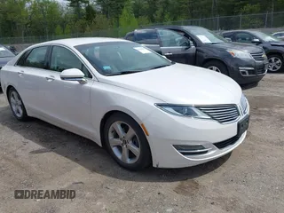 2015 Lincoln MKZ Hybrid z VIN 3LN6L2LU6FR605723, wystawiony jako IAAI lot #42246269 z przebiegiem 121 942 mil mil oraz . Historia ofert i sprzedaży dostępna na DreamBid. Obrazek 1.