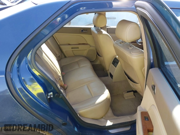 2009 Cadillac STS AWD w/1SB with VIN 1G6DD67VX90130281, listed as a IAAI auction lot 41384191 with 102,943 mi miles. Bid and sale history available at carsss.com. Image 8.