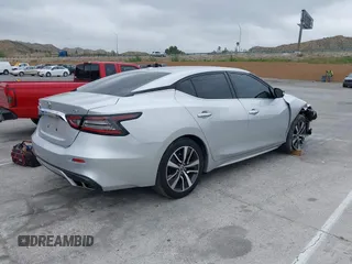 2020 Nissan Maxima SV with VIN 1N4AA6CVXLC380646, listed as a IAAI auction lot 42041422 with 99,579 mi miles and . Bid and sale history available at DreamBid. Image 4.