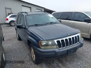2003 Jeep Grand Cherokee Laredo with VIN 1J4GW48S33C592906, listed as a IAAI auction lot 42445759 with Not provided miles and . Bid and sale history available at DreamBid. Image 1.