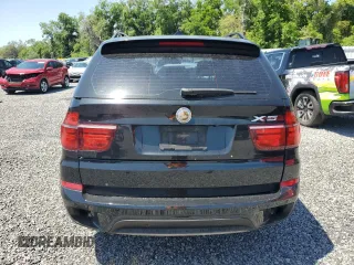 2011 BMW X5 35d with VIN 5UXZW0C58BL662048, listed as a Copart auction lot 55648975 with 166,291 mi miles and Salvage title. Bid and sale history available at DreamBid. Image 6.