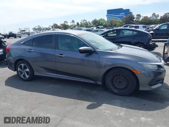 2017 Honda Civic LX with VIN 2HGFC2F52HH566363, listed as a IAAI auction lot 41934807 with 94,063 mi miles and . Bid and sale history available at DreamBid. Image 13.