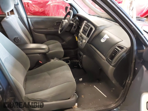 2003 Mazda Tribute LX with VIN 4F2YZ94193KM56345, listed as a IAAI auction lot 41200769 with 141,728 mi miles and . Bid and sale history available at DreamBid. Image 5.