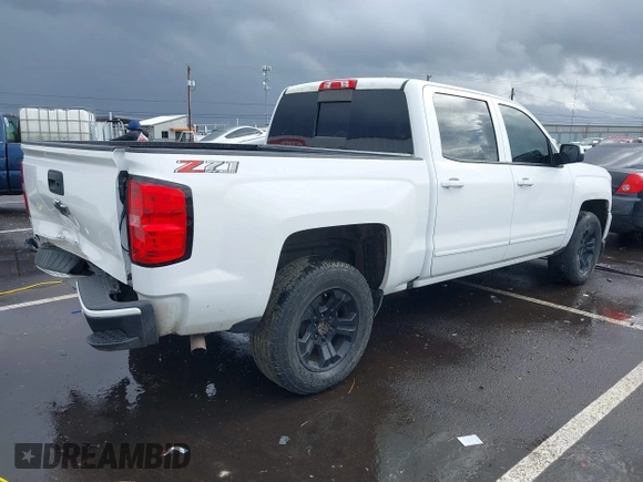 2018 Chevrolet Silverado 1500 LT with VIN 3GCUKREC5JG595959, listed as a IAAI auction lot 41608507 with 117,824 mi miles. Bid and sale history available at carsss.com. Image 4.