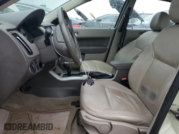 2011 Ford Focus SEL with VIN 1FAHP3HN1BW147174, listed as a Copart auction lot 56083434 with 87,287 mi miles and Salvage Title. Bid and sale history available at carsss.com. Image 7.