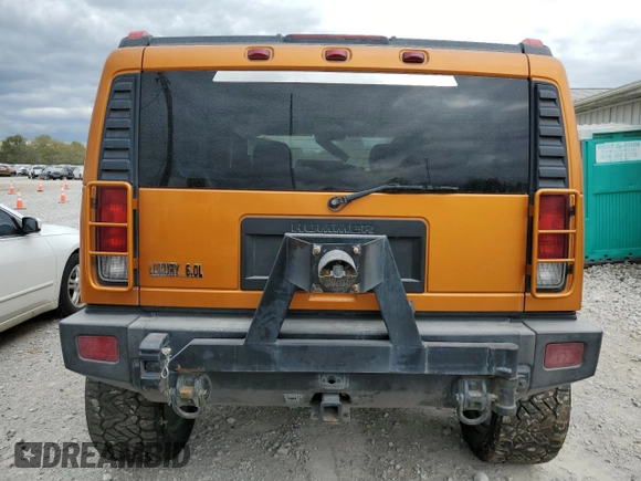 2006 Hummer H2 with VIN 5GRGN23U46H115817, listed as a Copart auction lot 73933564 with 128,671 mi miles and Salvage Title. Bid and sale history available at carsss.com. Image 6.