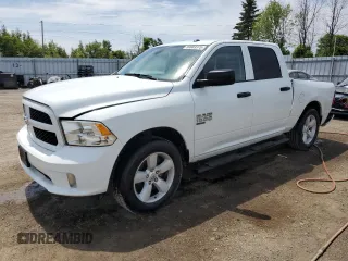 2023 Ram 1500 Tradesman z VIN 3C6RR7KG0PG661959, wystawiony jako Copart lot #59883375 z przebiegiem 31 942 mil mil oraz Szkoda całkowita • Salvage title. Historia ofert i sprzedaży dostępna na DreamBid. Obrazek 1.