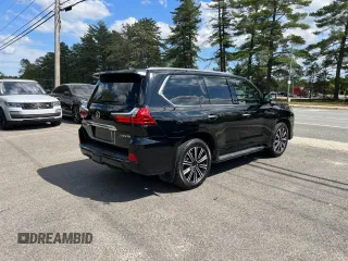 2018 Lexus LX 570 with VIN JTJHY7AX8J4258452, listed as a Copart auction lot 57357365 with 131,556 mi miles and Clean title. Bid and sale history available at DreamBid. Image 4.
