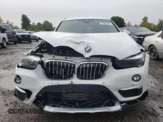 2019 BMW X1 xDrive28i with VIN WBXHT3C59K3H34632, listed as a Copart auction lot 65202402 with 44,866 mi miles. Bid and sale history available at carsss.com. Image 9.