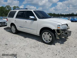 2012 Lincoln Navigator with VIN 5LMJJ2H51CEL04533, listed as a Copart auction lot 71245454 with 153,314 mi miles and Salvage Title. Bid and sale history available at carsss.com. Image 4.