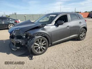 2017 Mazda CX-3 Touring z VIN JM1DKDC77H0151148, wystawiony jako Copart lot #81897434 z przebiegiem Nie podano mil oraz Szkoda całkowita • Salvage title. Historia ofert i sprzedaży dostępna na DreamBid. Obrazek 1.