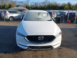 2017 Mazda CX-5 Touring with VIN JM3KFBCL8H0136601, listed as a IAAI auction lot 41830355 with 113,677 mi miles. Bid and sale history available at carsss.com. Image 13.