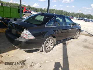 2008 Ford Taurus SEL with VIN 1FAHP24W08G163586, listed as a Copart auction lot 73031094 with 186,034 mi miles and Salvage Title. Bid and sale history available at carsss.com. Image 3.