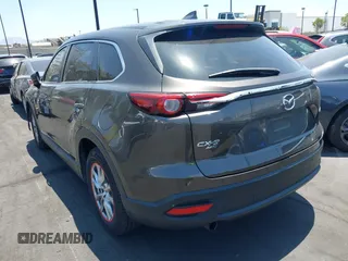 2017 Mazda CX-9 Touring with VIN JM3TCBCY1H0131233, listed as a IAAI auction lot 42490137 with 84,216 mi miles and . Bid and sale history available at DreamBid. Image 3.