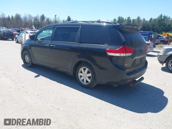 2011 Toyota Sienna XLE with VIN 5TDDK3DC8BS011975, listed as a IAAI auction lot 42112522 with 124,251 mi miles. Bid and sale history available at carsss.com. Image 3.