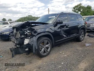 2019 Volkswagen Atlas SE with VIN 1V2XR2CA2KC541975, listed as a Copart auction lot 61656455 with 57,401 mi miles and Salvage title. Bid and sale history available at DreamBid. Image 1.
