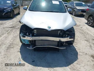 2021 BMW X1 sDrive28i with VIN WBXJG7C06M5T14235, listed as a IAAI auction lot 42021762 with 53,384 mi miles and . Bid and sale history available at DreamBid. Image 6.