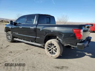 2017 Nissan Titan SL z VIN 1N6BA1F20HN522403, wystawiony jako Copart lot #87477114 z przebiegiem 98 084 mil mil oraz Szkoda całkowita • Salvage title. Historia ofert i sprzedaży dostępna na DreamBid. Obrazek 2.
