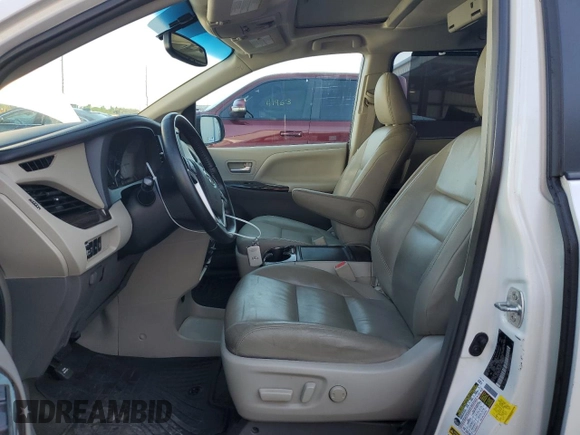2015 Toyota Sienna XLE with VIN 5TDYK3DC0FS679812, listed as a Copart auction lot 61600775 with 118,483 mi miles and Salvage title. Bid and sale history available at DreamBid. Image 7.