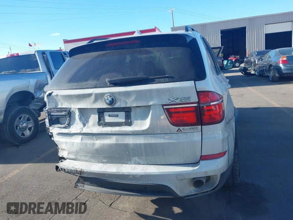 2012 BMW X5 35d with VIN 5UXZW0C56CL665631, listed as a IAAI auction lot 41055705 with 179,408 mi miles and . Bid and sale history available at DreamBid. Image 16.
