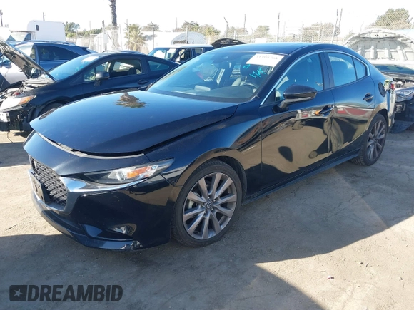 2022 Mazda 3 Carbon Edition z VIN JM1BPACLXN1507604, wystawiony jako IAAI lot #41408768 z przebiegiem 77 239 mil mil oraz . Historia ofert i sprzedaży dostępna na DreamBid. Obrazek 17.