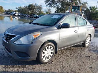 2016 Nissan Versa S Plus with VIN 3N1CN7AP1GL882220, listed as a IAAI auction lot 41432001 with 105,020 mi miles. Bid and sale history available at carsss.com. Image 2.
