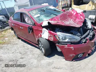 2019 Nissan Sentra S z VIN 3N1AB7AP9KY328855, wystawiony jako IAAI lot #42195174 z przebiegiem 93 970 mil mil oraz . Historia ofert i sprzedaży dostępna na DreamBid. Obrazek 1.