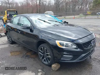 2018 Volvo S60 Dynamic with VIN YV140MTLXJ2459745, listed as a IAAI auction lot 41988052 with 133,268 mi miles. Bid and sale history available at carsss.com. Image 1.