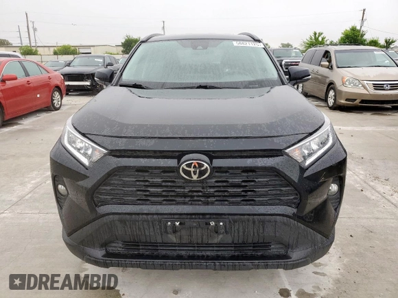 2021 Toyota RAV4 XLE with VIN 2T3W1RFV0MW149640, listed as a Copart auction lot 58821125 with 105,483 mi miles and Salvage title. Bid and sale history available at DreamBid. Image 5.
